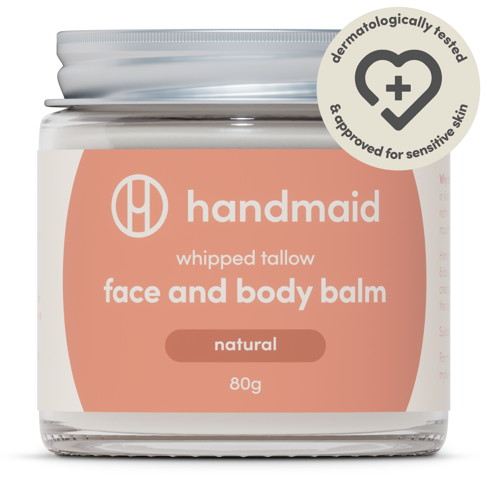 Jar of 'handmaid' whipped tallow face and body balm with a pink label on a white background
